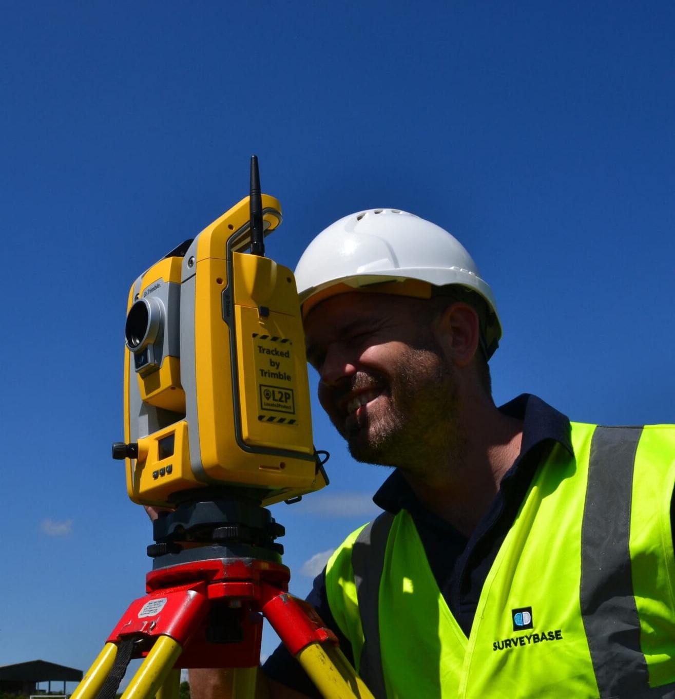 Surveybase surveyor using total station equipment for a topographical survey